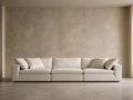 Cushing 3-seat modular sofa in Ivory Linen against a plaster wall, front view